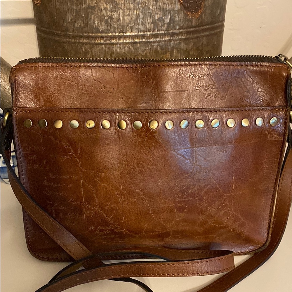 Vintage Patricia Nash gold studded map leather crossbody with adjustable strap